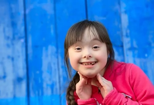 smiling girl with special needs