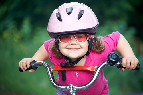 young girl on bicycle