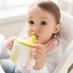 baby with sippy cup