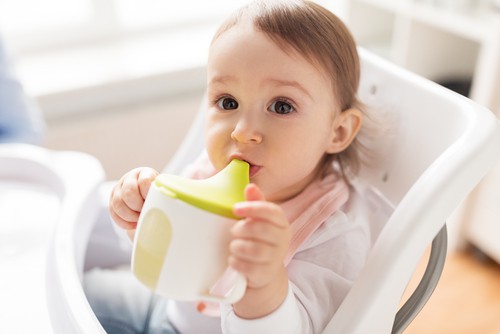 baby with sippy cup