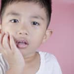 child with toothache