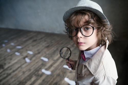 child dressed as detective